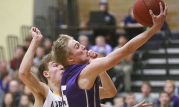 Bassett scores 1,000th point